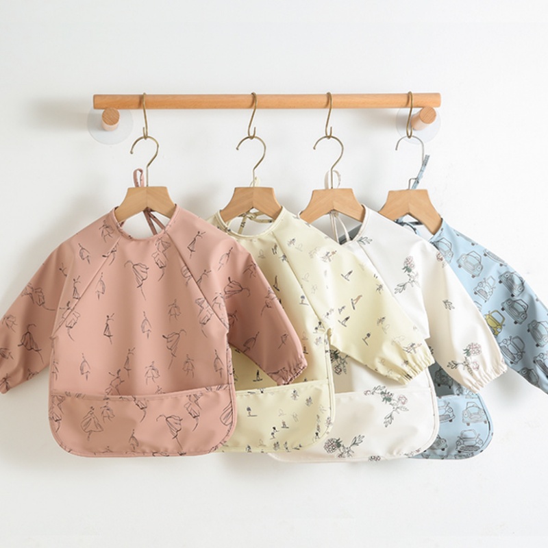 Bavaglino reversibile in PU a  - Bib Long Sleeve recensione e prezzo