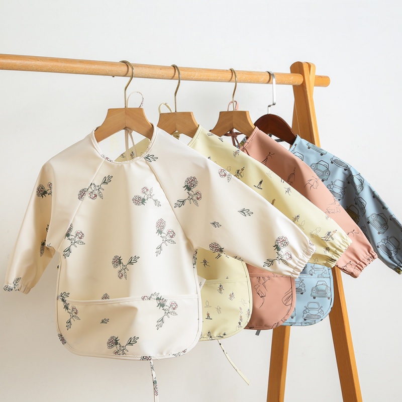 Bavaglino reversibile in PU a  - Bib Long Sleeve recensione e prezzo